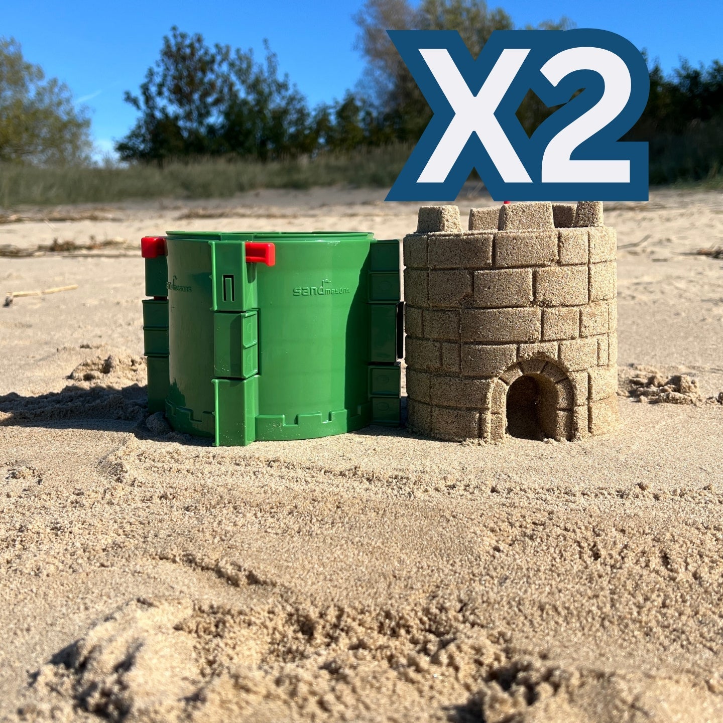 Sandmasons Sandcastle Kit green forms for building round sand and snow castle towers and walls.