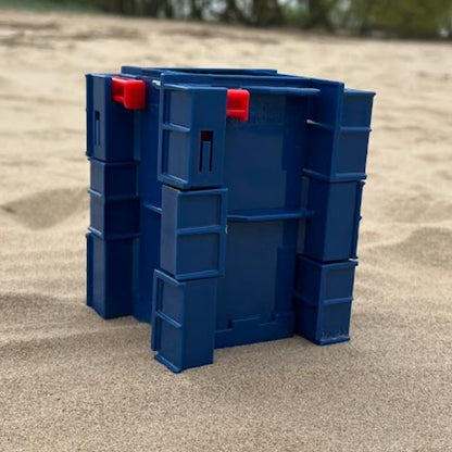 Sandmasons blue sandcastle kit wall and tower forms for detailed castle construction in sand or snow.